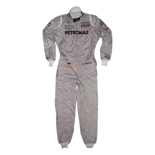 Michael Schumacher 2010 Mercedes AMG Petronas F1 Racing Suit in silver featuring iconic Mercedes-AMG Petronas team graphics, authentic sponsor detailing, and championship inspired design