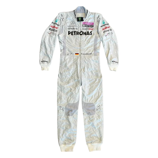 Michael Schumacher 2011 Mercedes-AMG Petronas F1 Racing Suit featuring iconic silver Mercedes-AMG Petronas team graphics and authentic sponsor detailing