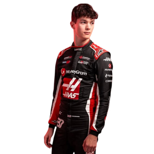 Oliver Bearman 2025 Haas F1 race suit in black, white, and red with sponsor branding and detailed VF 25 team design and logos