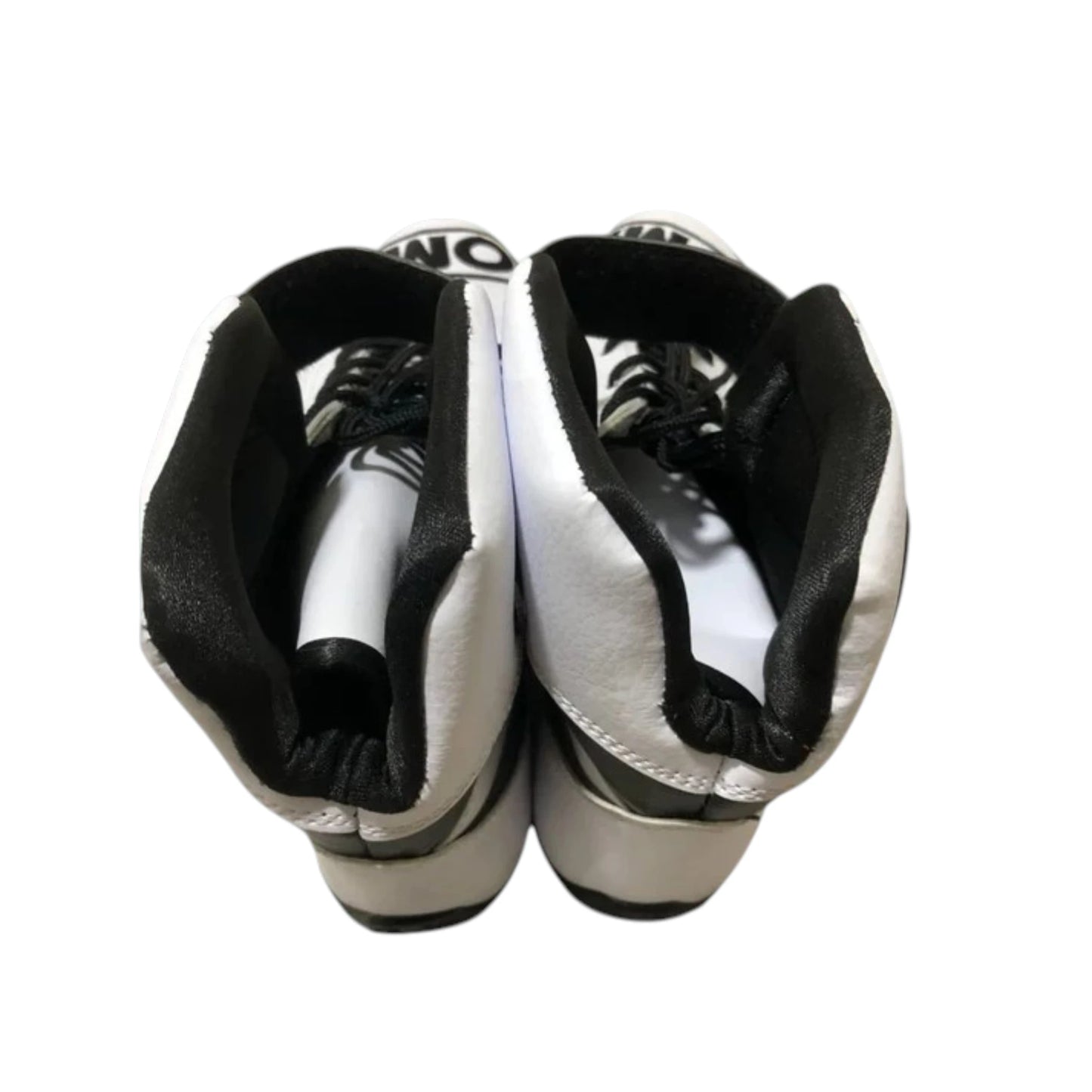 Sonny Hayes APXGP OMP F1 racing shoes featuring white and black APXGP OMP styling with motorsport detailing