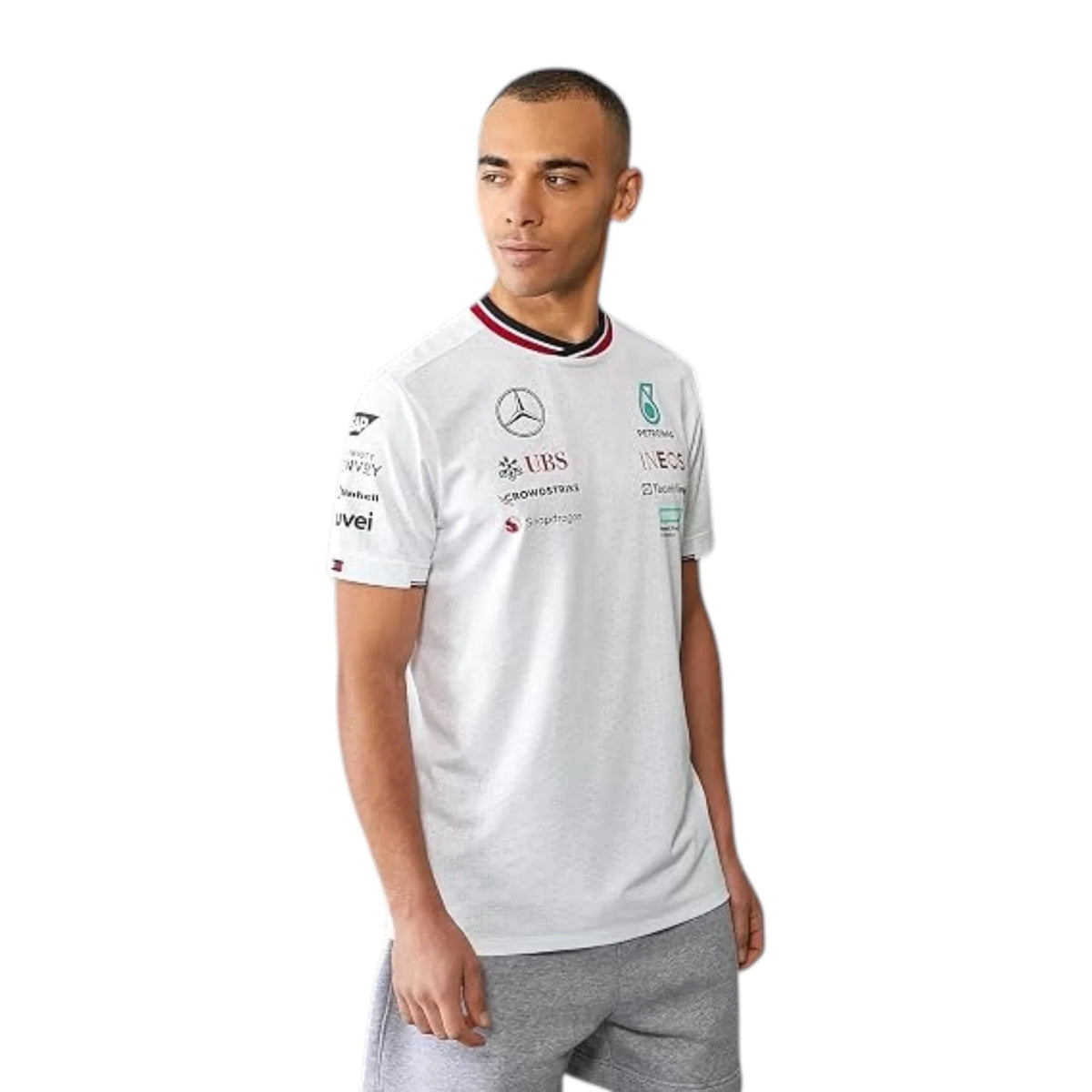 2024 Mercedes-AMG Petronas F1 Pilot T-Shirt in white featuring Mercedes-AMG, Petronas and team sponsor logos with a red and black striped crew neck