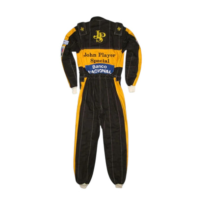Ayrton Senna 1985 Lotus F1 Racing Suit featuring iconic black and gold Lotus racing graphics with authentic sponsor detailing