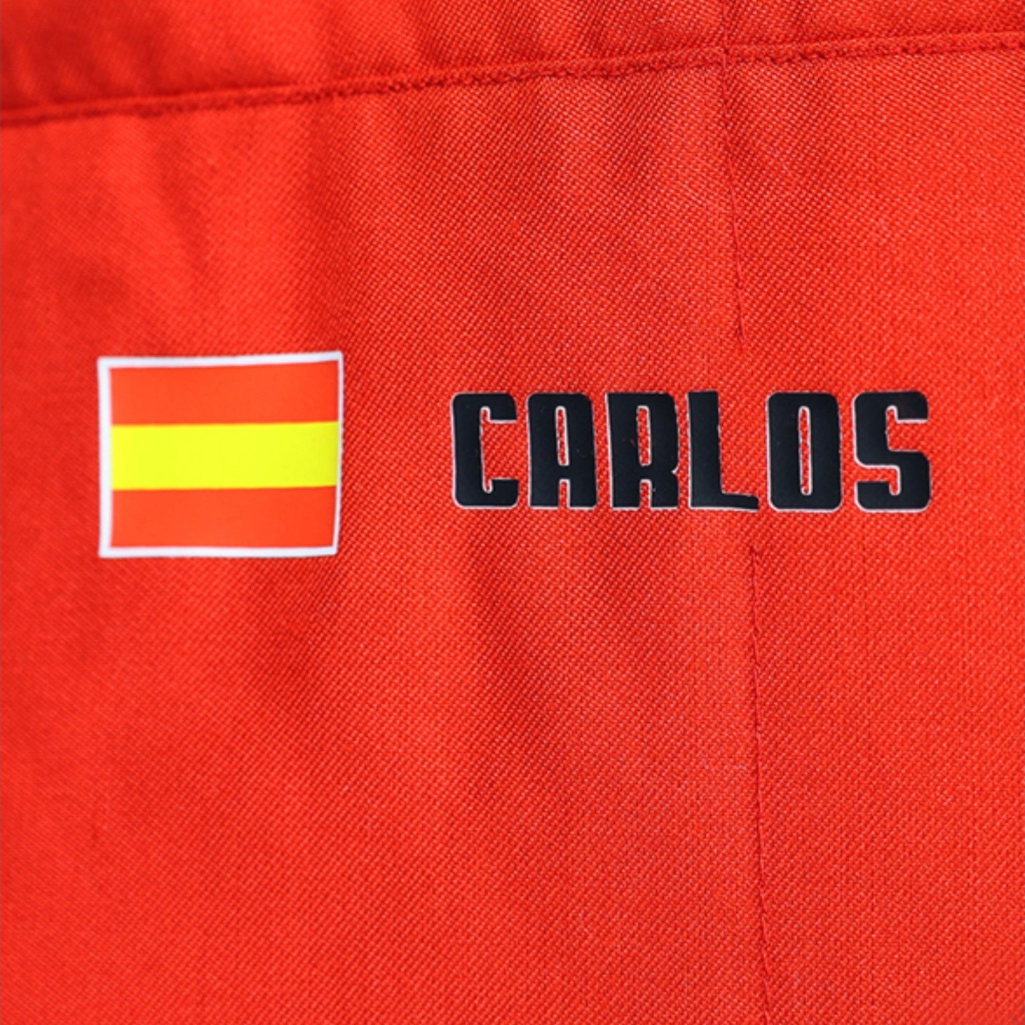 Carlos Sainz 2021 Ferrari F1 race suit in signature red with sponsor branding
