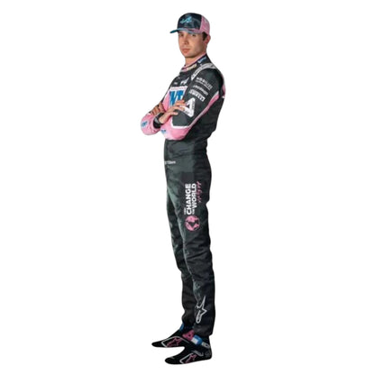 Esteban Ocon 2023 Alpine F1 race suit in black with pink panels and blue accents with sponsor logos