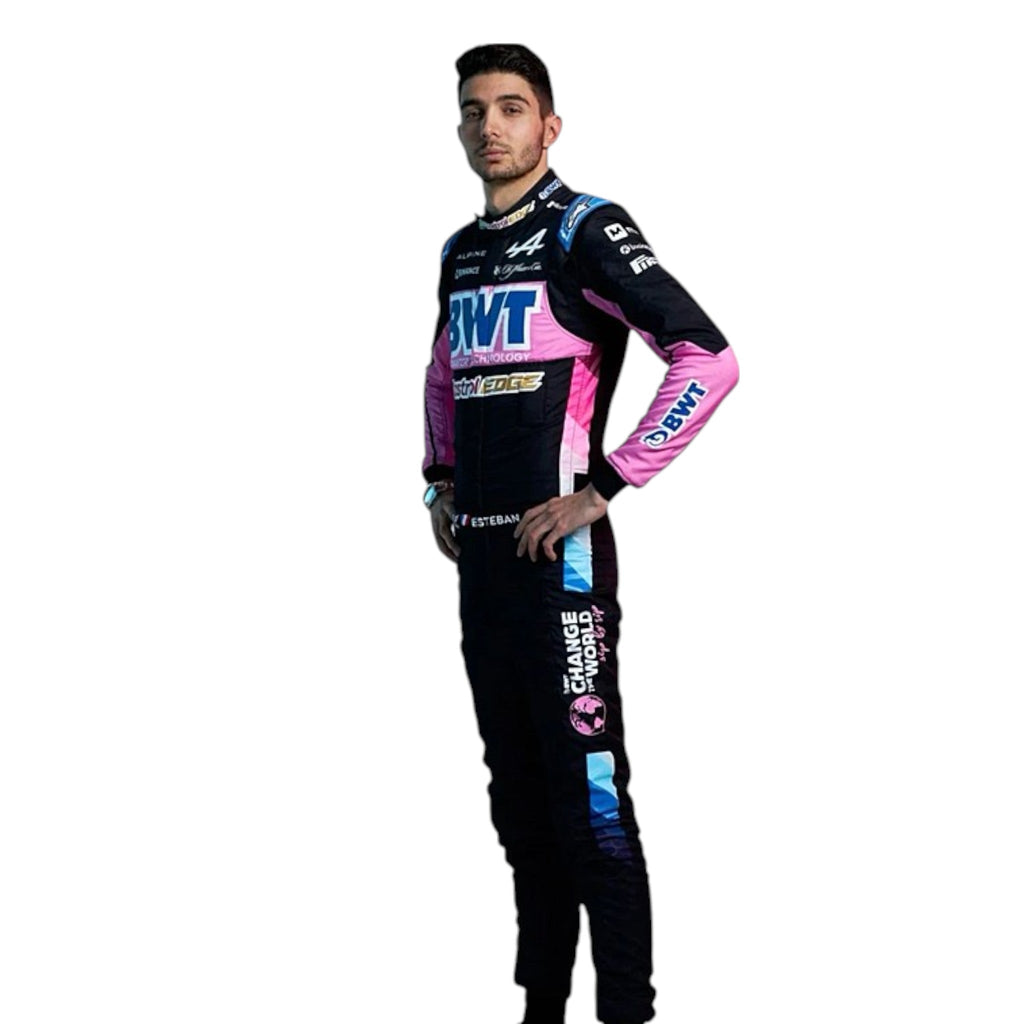 Esteban Ocon 2024 Alpine F1 race suit in black, blue, and pink with sponsor branding