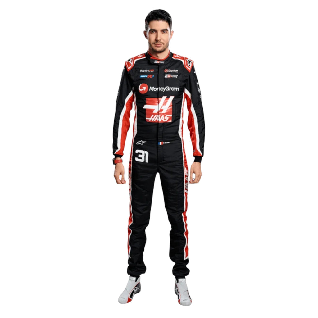 Esteban Ocon 2025 Haas F1 race suit in black, white, and red with sponsor branding and VF 25 team branding