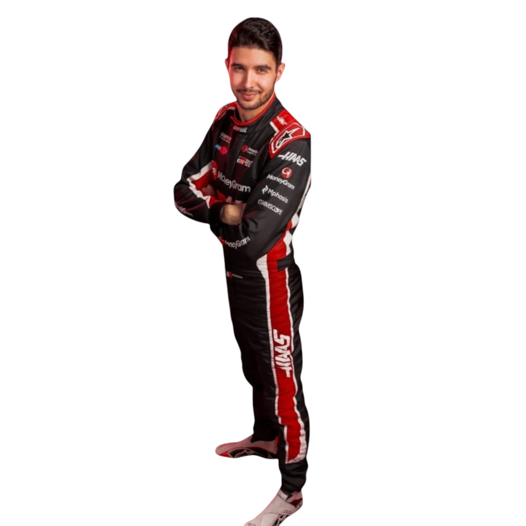 Esteban Ocon 2025 Haas F1 race suit in black, white, and red with sponsor branding and VF 25 team branding