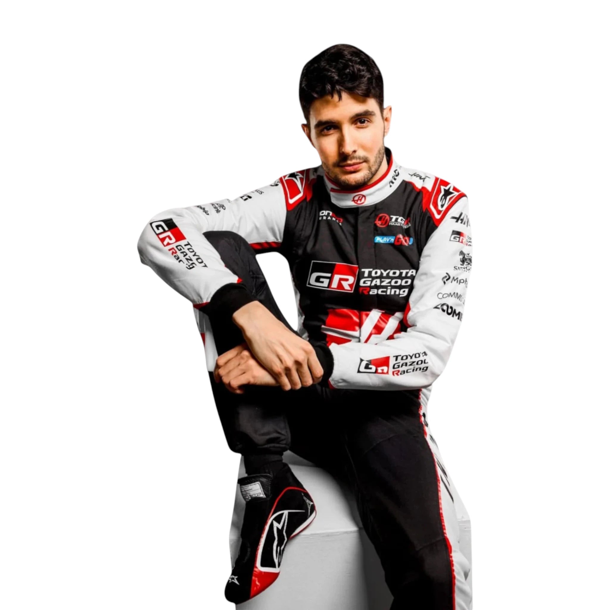 Esteban Ocon 2026 Haas F1 race suit in black, white, and red with sponsor logos