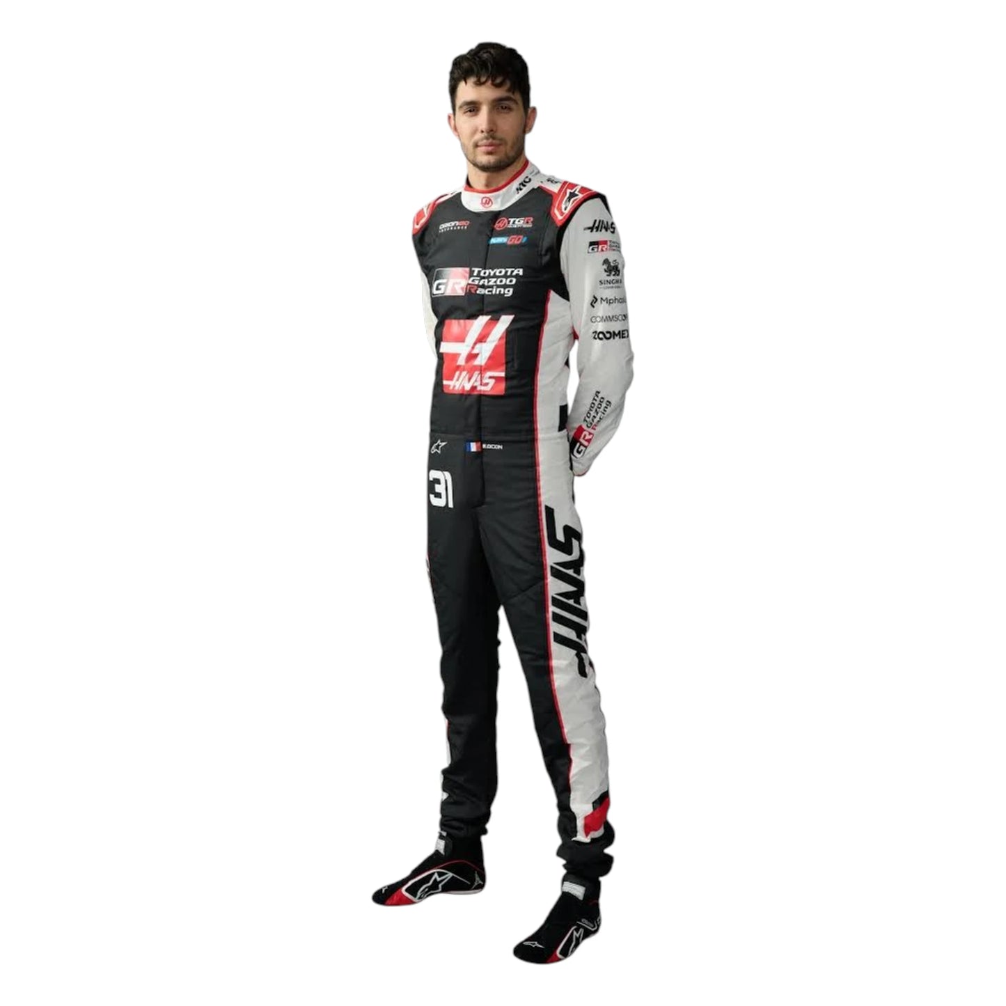 Esteban Ocon 2026 Haas F1 race suit in black, white, and red with sponsor logos