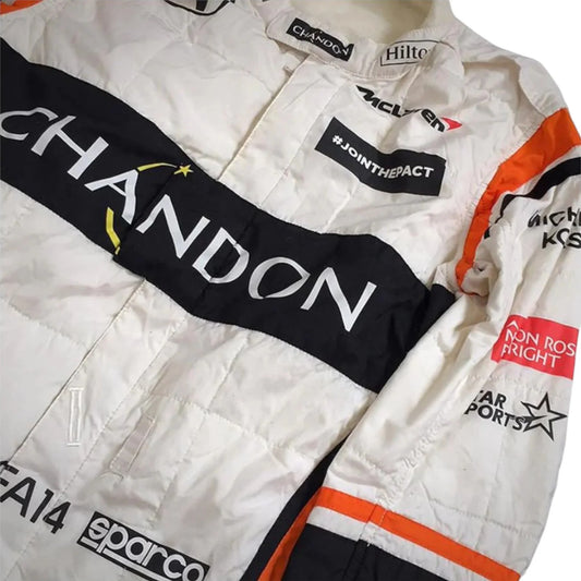 Fernando Alonso 2017 McLaren F1 race suit in white with black and orange accents design featuring Chandon sponsor