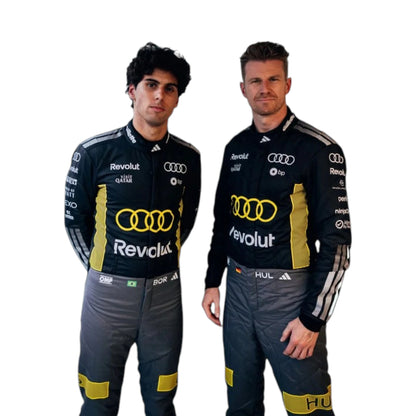 Gabriel Bortoleto 2026 Audi Monaco GP F1 Racing Suit in black and yellow featuring Audi team branding, sponsor logos, and distinctive racing details