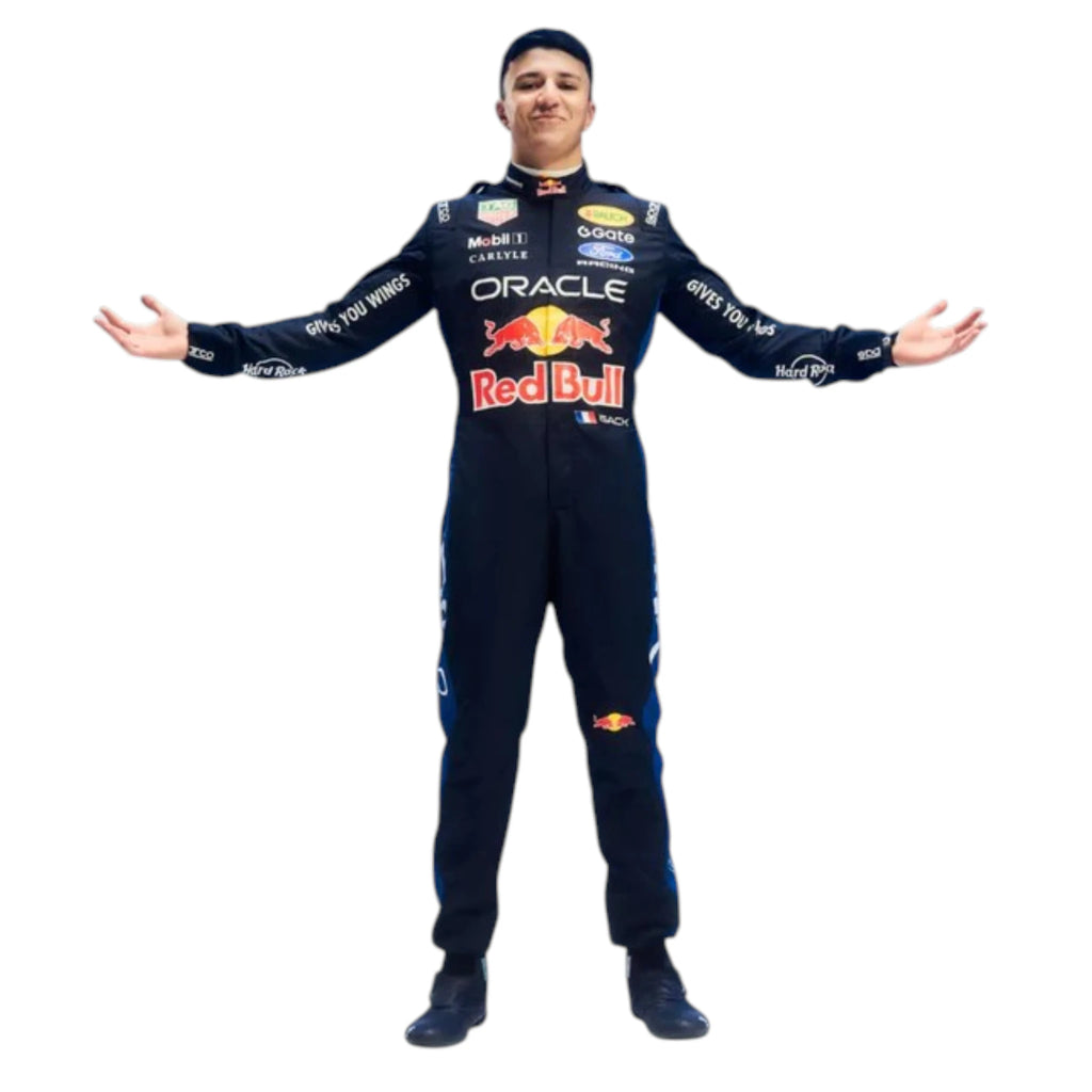 Isack Hadjar 2026 Red Bull F1 race suit in dark navy blue with red and yellow accents featuring sponsor logos