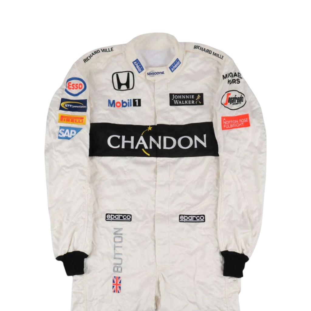 Jenson Button 2016 McLaren F1 race suit in white with black Chandon branding and McLaren Honda sponsor logos
