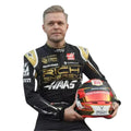 Kevin Magnussen 2019 Haas F1 race suit in black and gold with sponsor logos