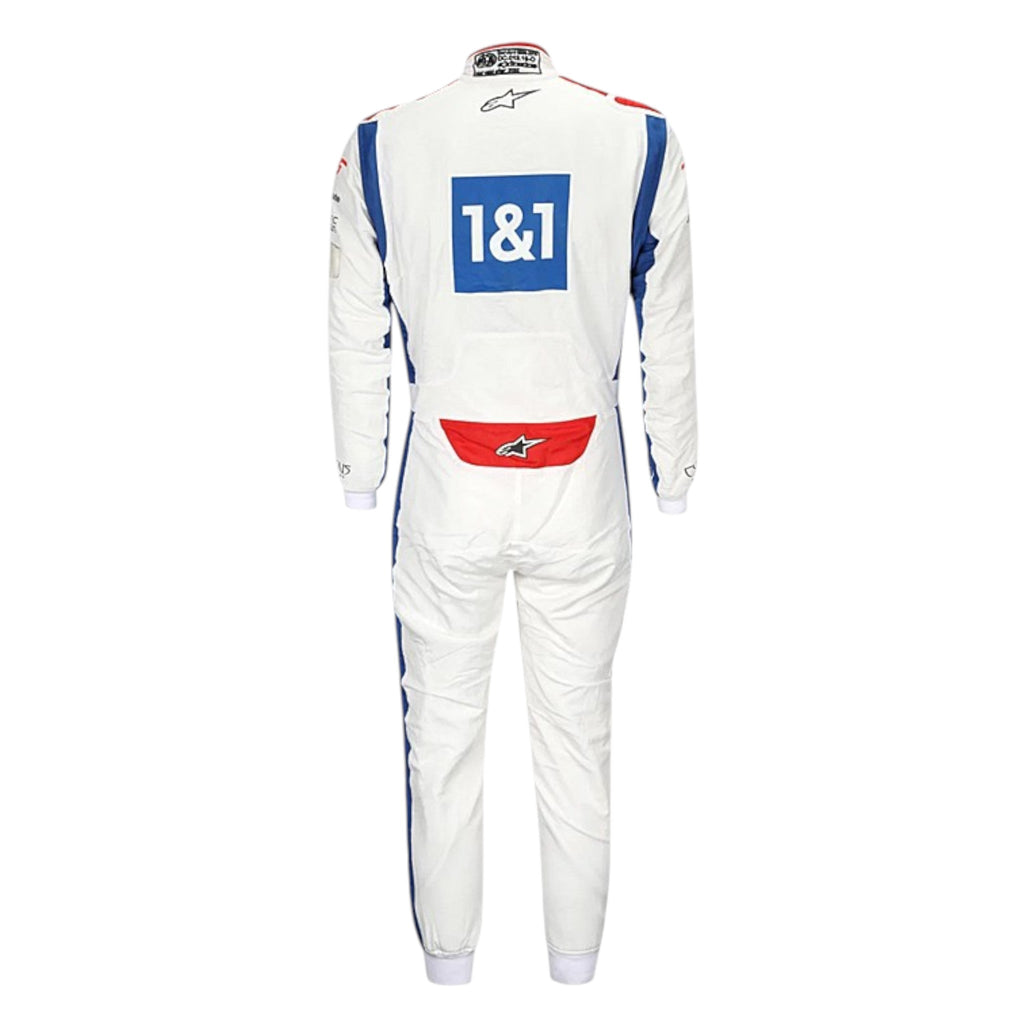 Kevin Magnussen 2022 Haas F1 race suit in white with red Haas chest logo, blue shoulders, and red blue side striping