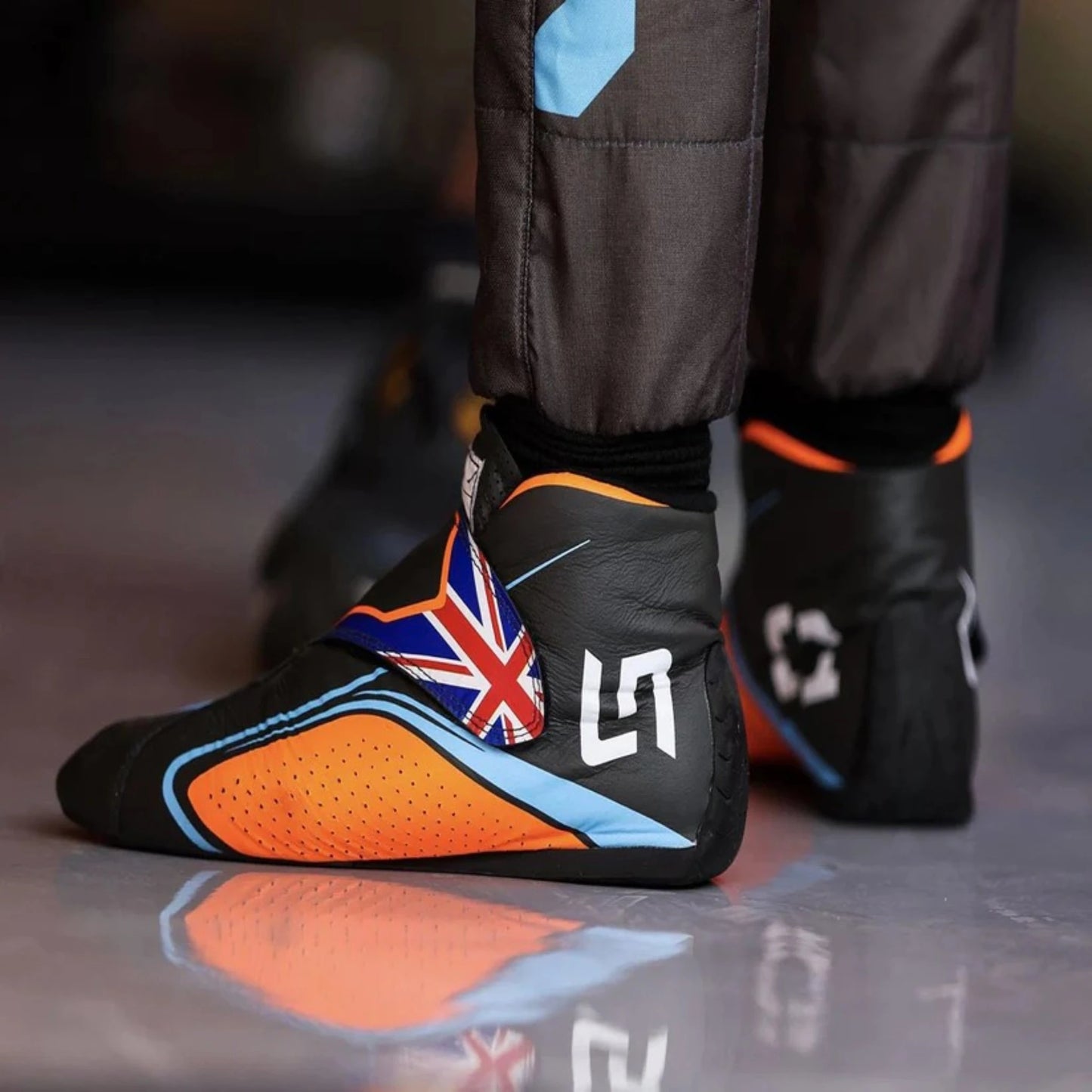 Lando Norris 2022 McLaren F1 racing shoes featuring McLaren inspired styling and motorsport detailing