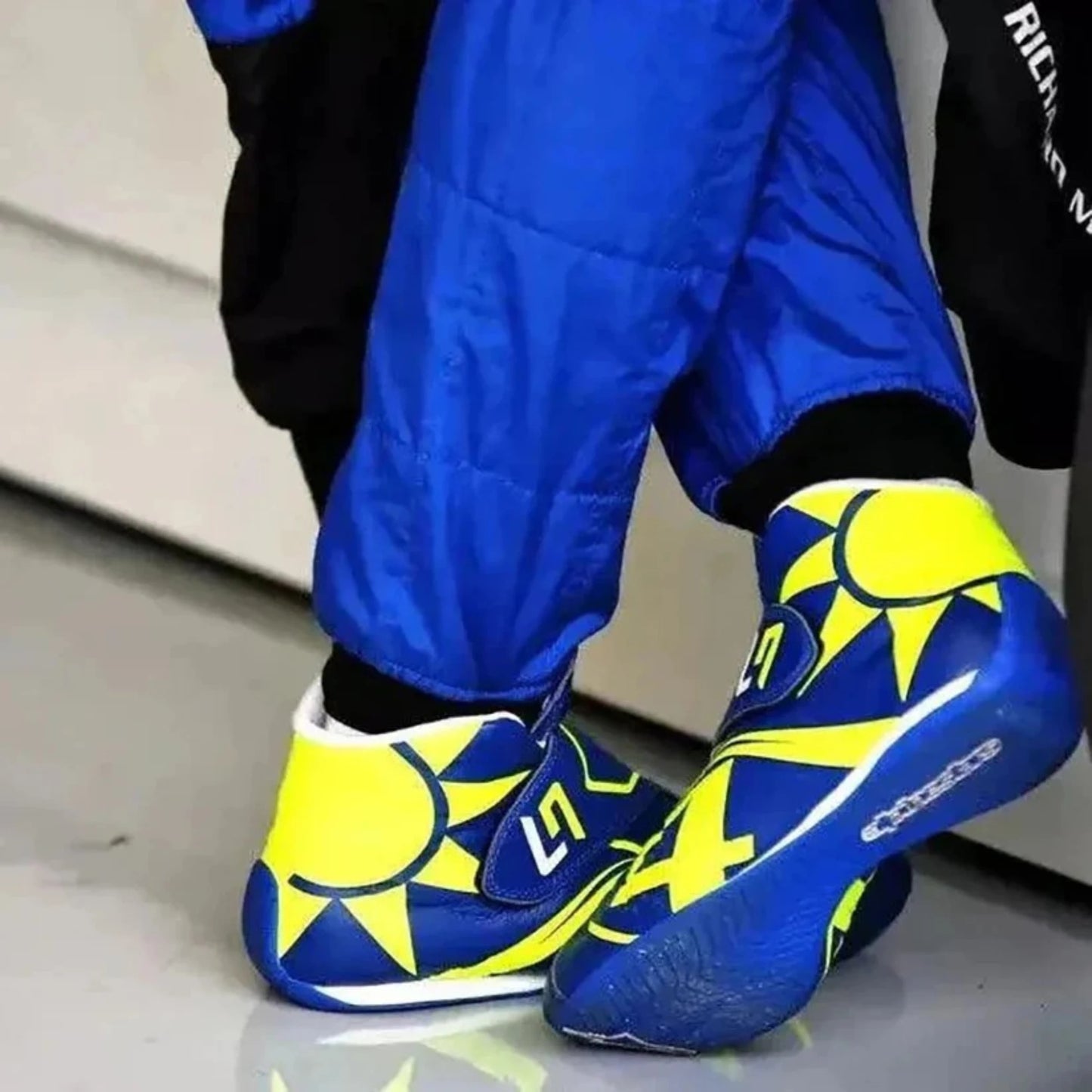 Lando Norris 2023 McLaren F1 racing shoes featuring McLaren inspired styling and motorsport detailing