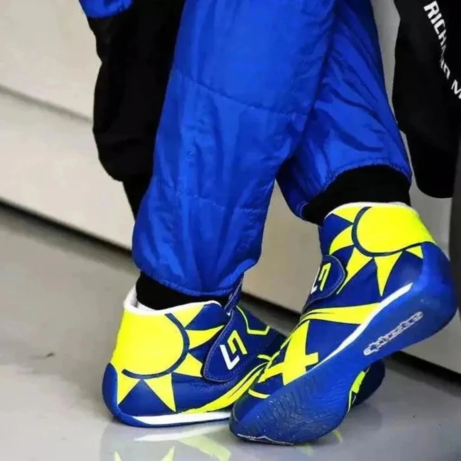 Lando Norris 2023 McLaren F1 racing shoes featuring McLaren inspired styling and motorsport detailing