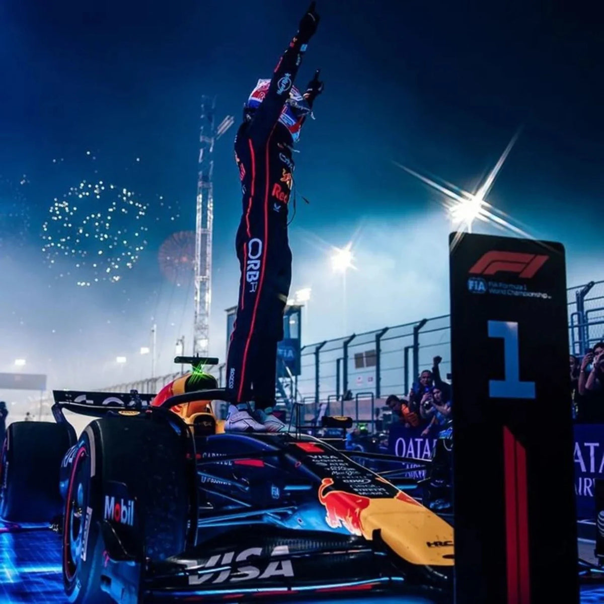 Max Verstappen 2025 Red Bull F1 race suit in dark navy with Red Bull Racing branding and sponsor logos