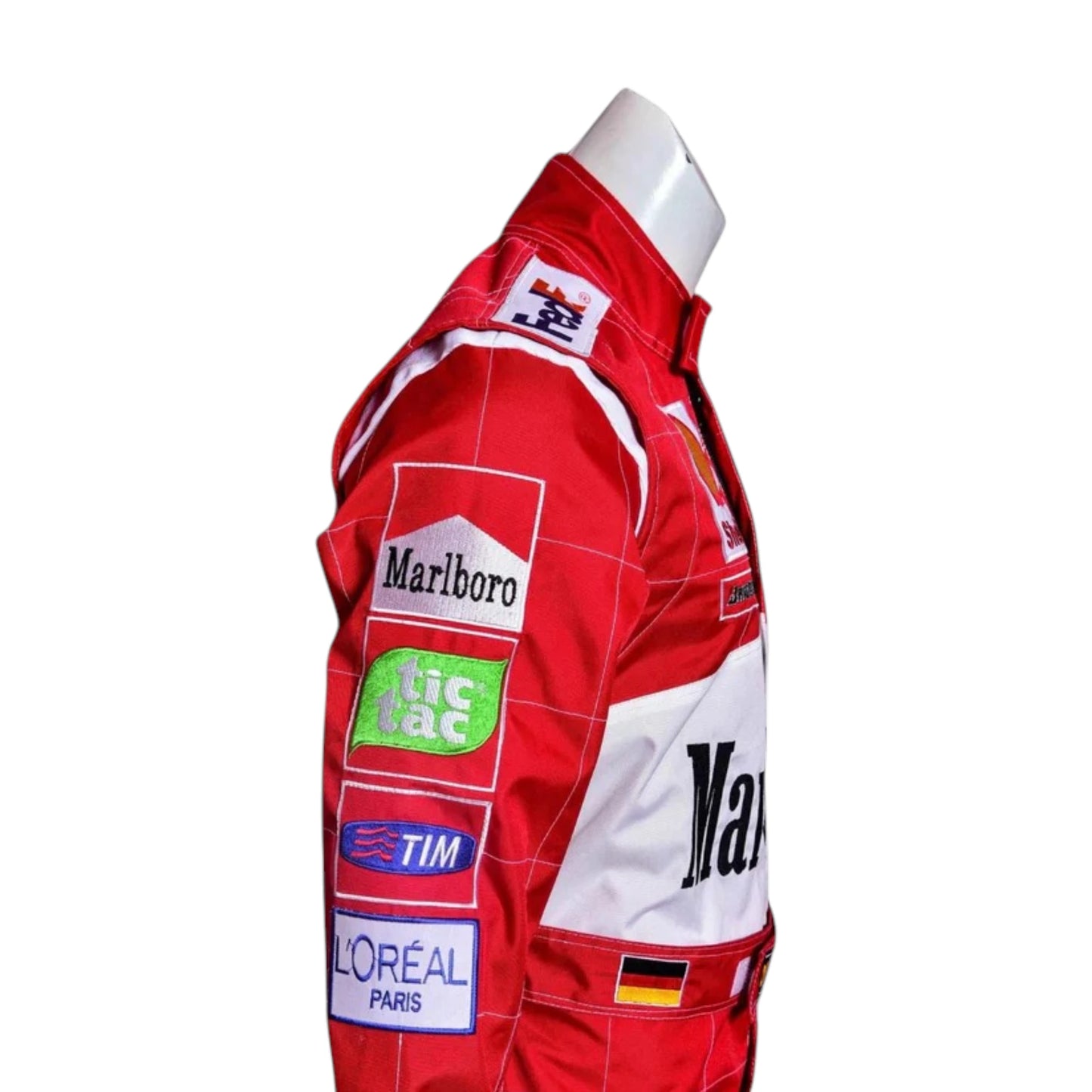 Michael Schumacher 2000 Ferrari F1 Racing Suit featuring iconic red Ferrari racing graphics and authentic sponsor detailing