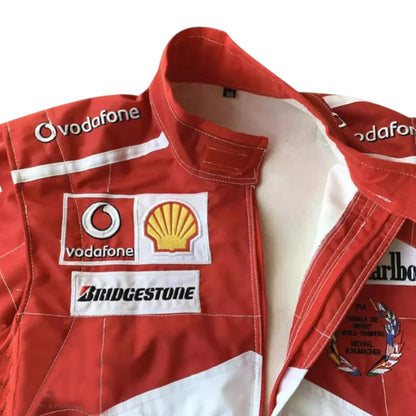 Michael Schumacher 2005 Ferrari F1 Racing Suit in red featuring iconic Ferrari racing graphics, authentic sponsor detailing, and championship inspired design
