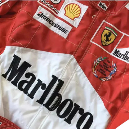 Michael Schumacher 2005 Ferrari F1 Racing Suit in red featuring iconic Ferrari racing graphics, authentic sponsor detailing, and championship inspired design