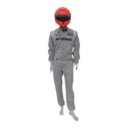 Michael Schumacher 2010 Mercedes AMG Petronas F1 Racing Suit in silver featuring iconic Mercedes-AMG Petronas team graphics, authentic sponsor detailing, and championship inspired design