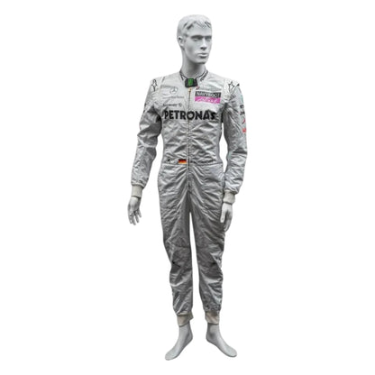 Michael Schumacher 2010 Mercedes AMG Petronas F1 Racing Suit in silver featuring iconic Mercedes-AMG Petronas team graphics, authentic sponsor detailing, and championship inspired design