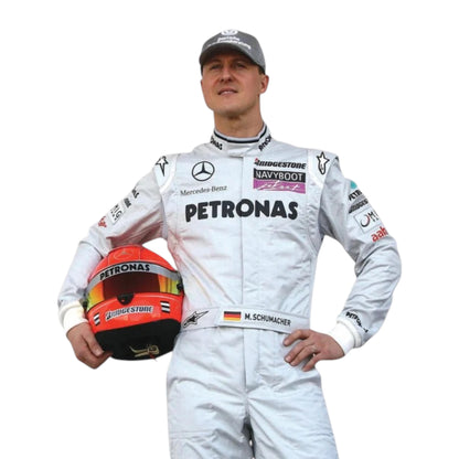 Michael Schumacher 2010 Mercedes AMG Petronas F1 Racing Suit in silver featuring iconic Mercedes-AMG Petronas team graphics, authentic sponsor detailing, and championship inspired design
