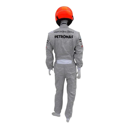Michael Schumacher 2010 Mercedes AMG Petronas F1 Racing Suit in silver featuring iconic Mercedes-AMG Petronas team graphics, authentic sponsor detailing, and championship inspired design