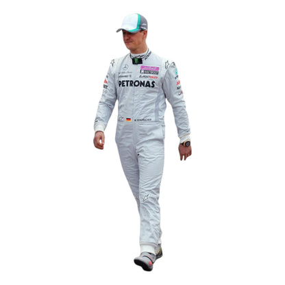 Michael Schumacher 2011 Mercedes-AMG Petronas F1 Racing Suit featuring iconic silver Mercedes-AMG Petronas team graphics and authentic sponsor detailing