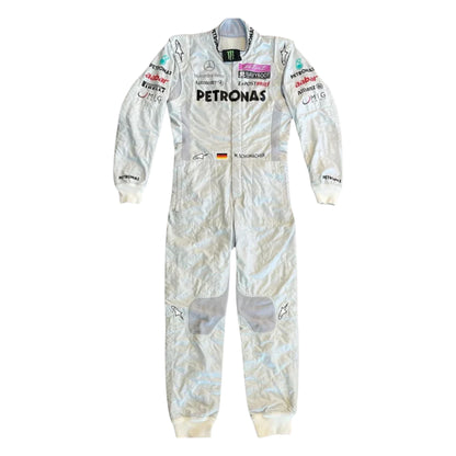 Michael Schumacher 2011 Mercedes-AMG Petronas F1 Racing Suit featuring iconic silver Mercedes-AMG Petronas team graphics and authentic sponsor detailing