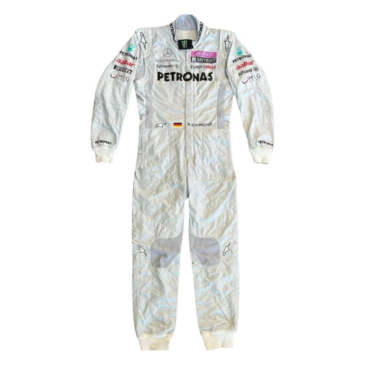 Michael Schumacher 2011 Mercedes-AMG Petronas F1 Racing Suit featuring iconic silver Mercedes-AMG Petronas team graphics and authentic sponsor detailing