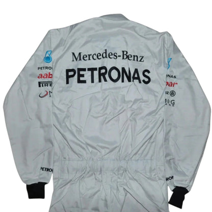 Michael Schumacher 2012 Mercedes-AMG Petronas F1 Racing Suit in white featuring iconic silver Mercedes-AMG Petronas team graphics and authentic sponsor detailing