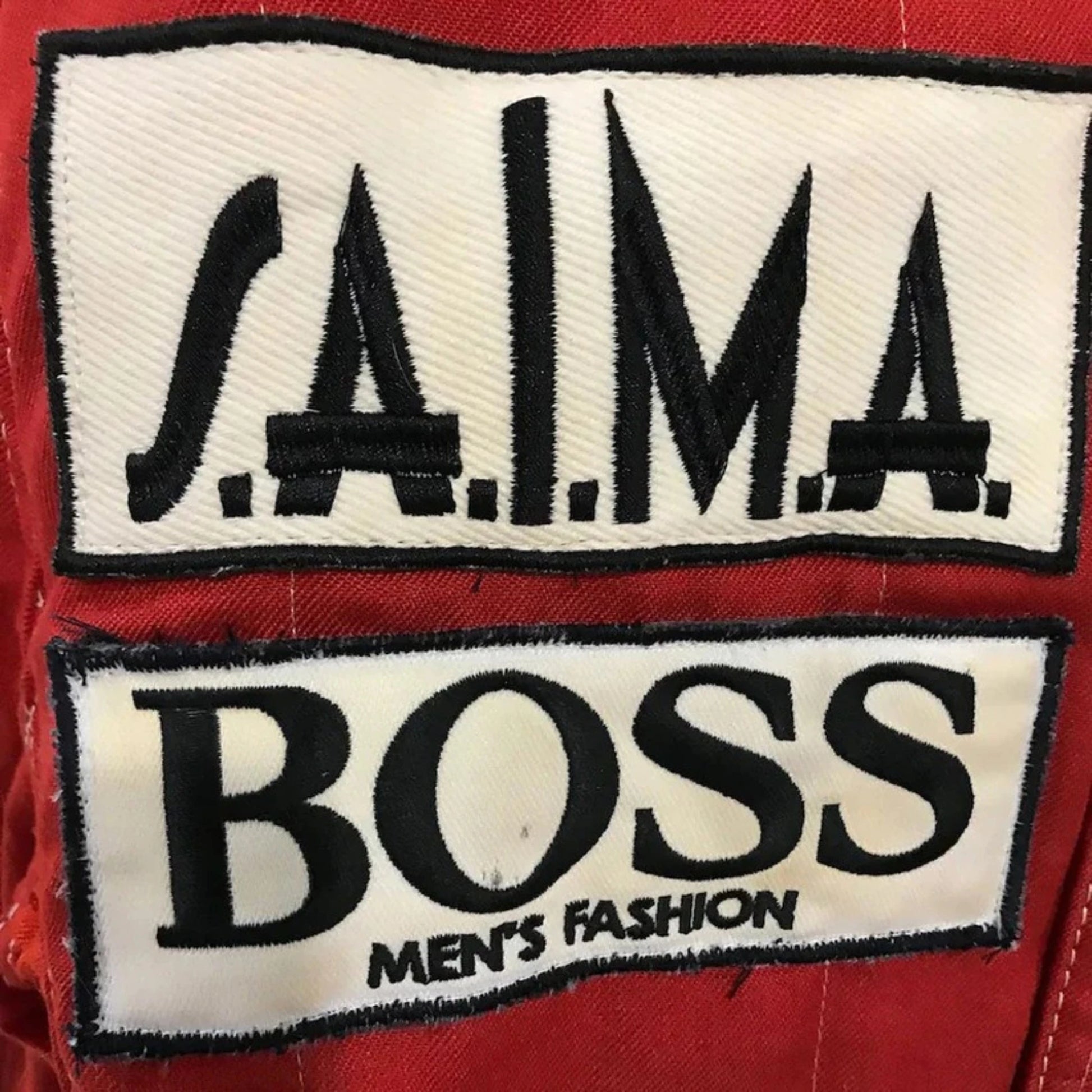 Niki Lauda 1984 McLaren F1 Racing Suit in red with authentic vintage Marlboro and Boss sponsor detailing