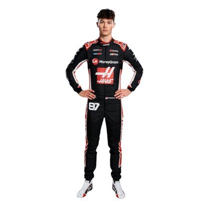 Oliver Bearman 2025 Haas F1 race suit in black, white, and red with sponsor branding and detailed VF 25 team design and logos