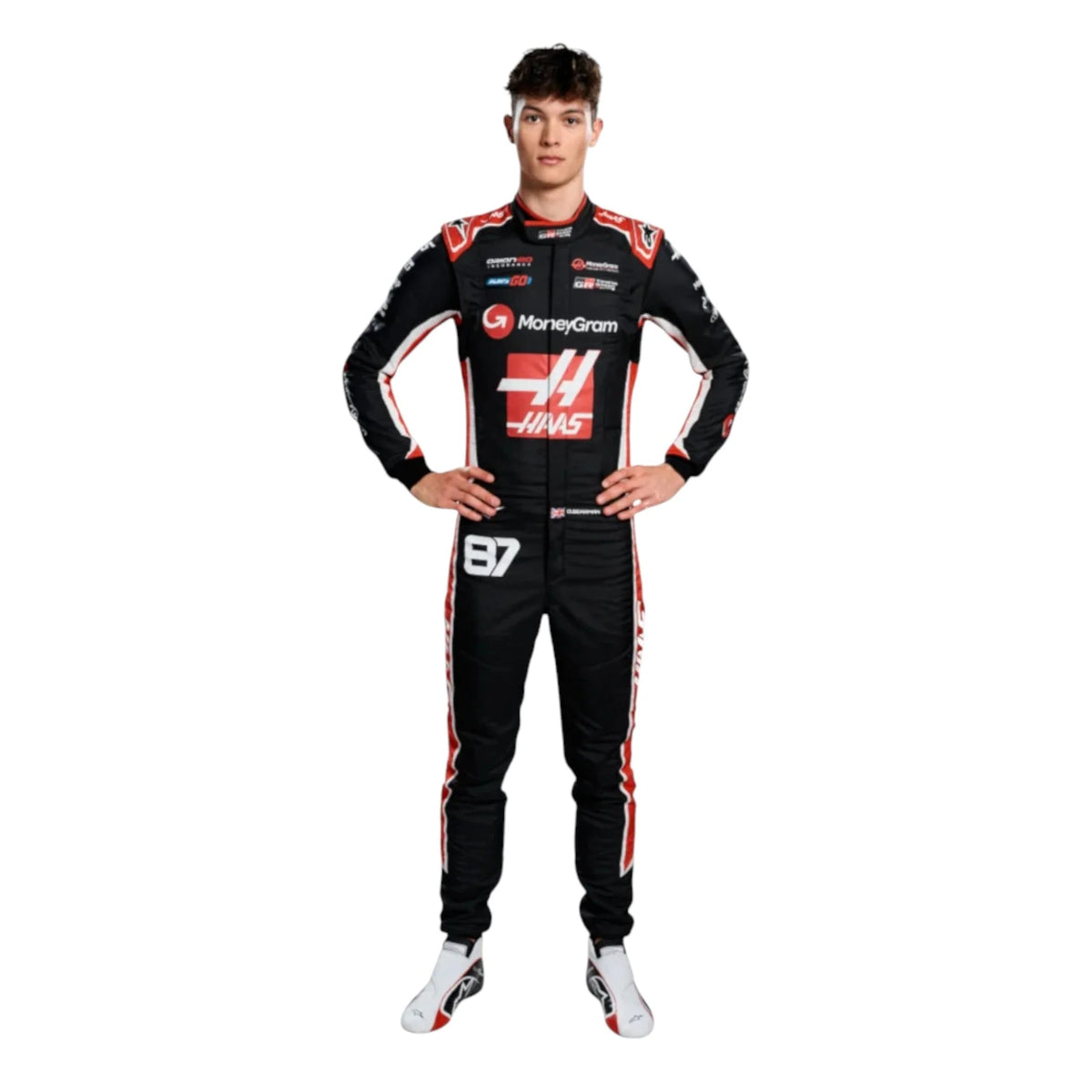 Oliver Bearman 2025 Haas F1 race suit in black, white, and red with sponsor branding and detailed VF 25 team design and logos