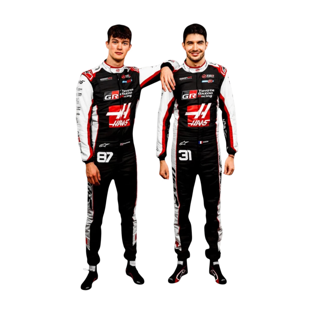 Oliver Bearman 2026 Haas F1 race suit in black, white, and red with sponsor logos