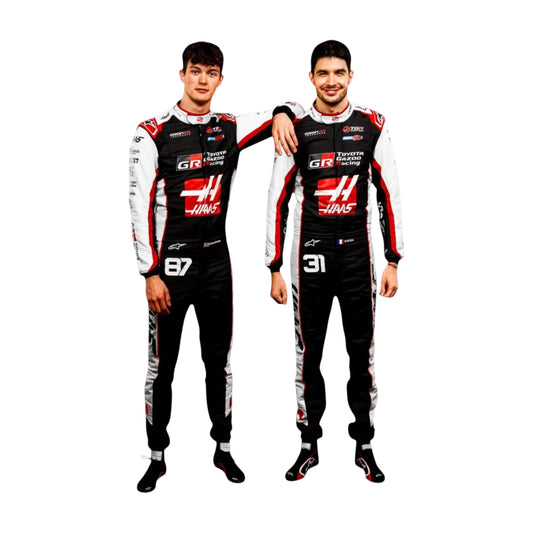 Oliver Bearman 2026 Haas F1 race suit in black, white, and red with sponsor logos