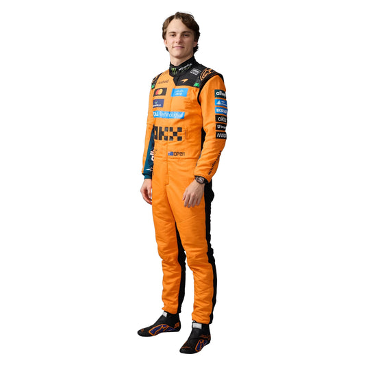Oscar Piastri 2026 McLaren F1 race suit in papaya orange with black accents and sponsor logos