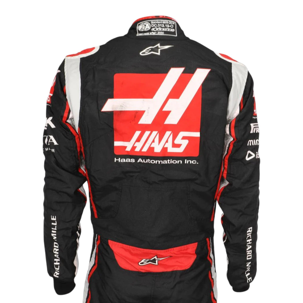 Romain Grosjean 2020 Haas F1 race suit in black with red chest panel and white side accents with sponsor logos