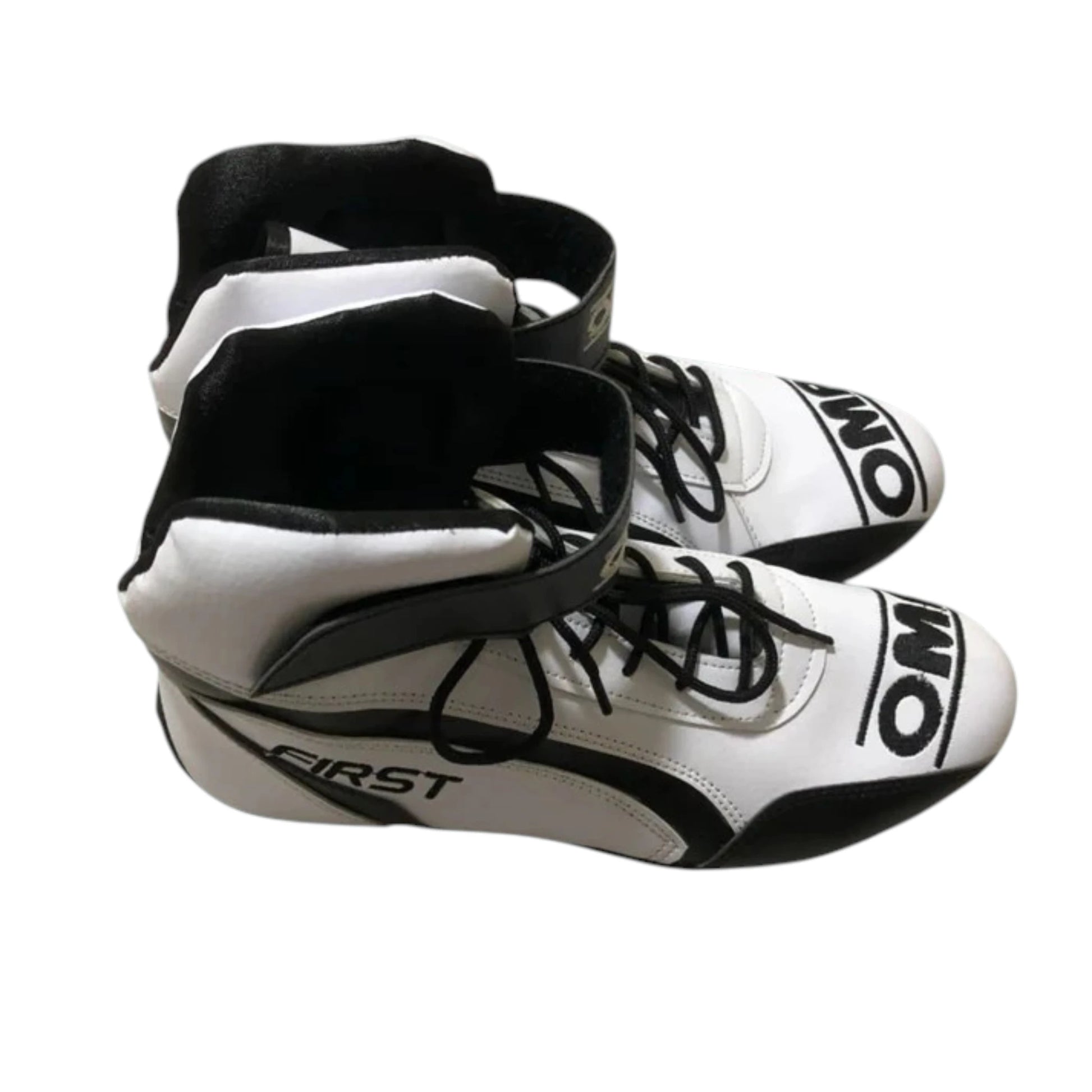 Sonny Hayes APXGP OMP F1 racing shoes featuring white and black APXGP OMP styling with motorsport detailing