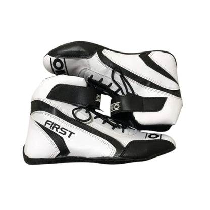 Sonny Hayes APXGP OMP F1 racing shoes featuring white and black APXGP OMP styling with motorsport detailing