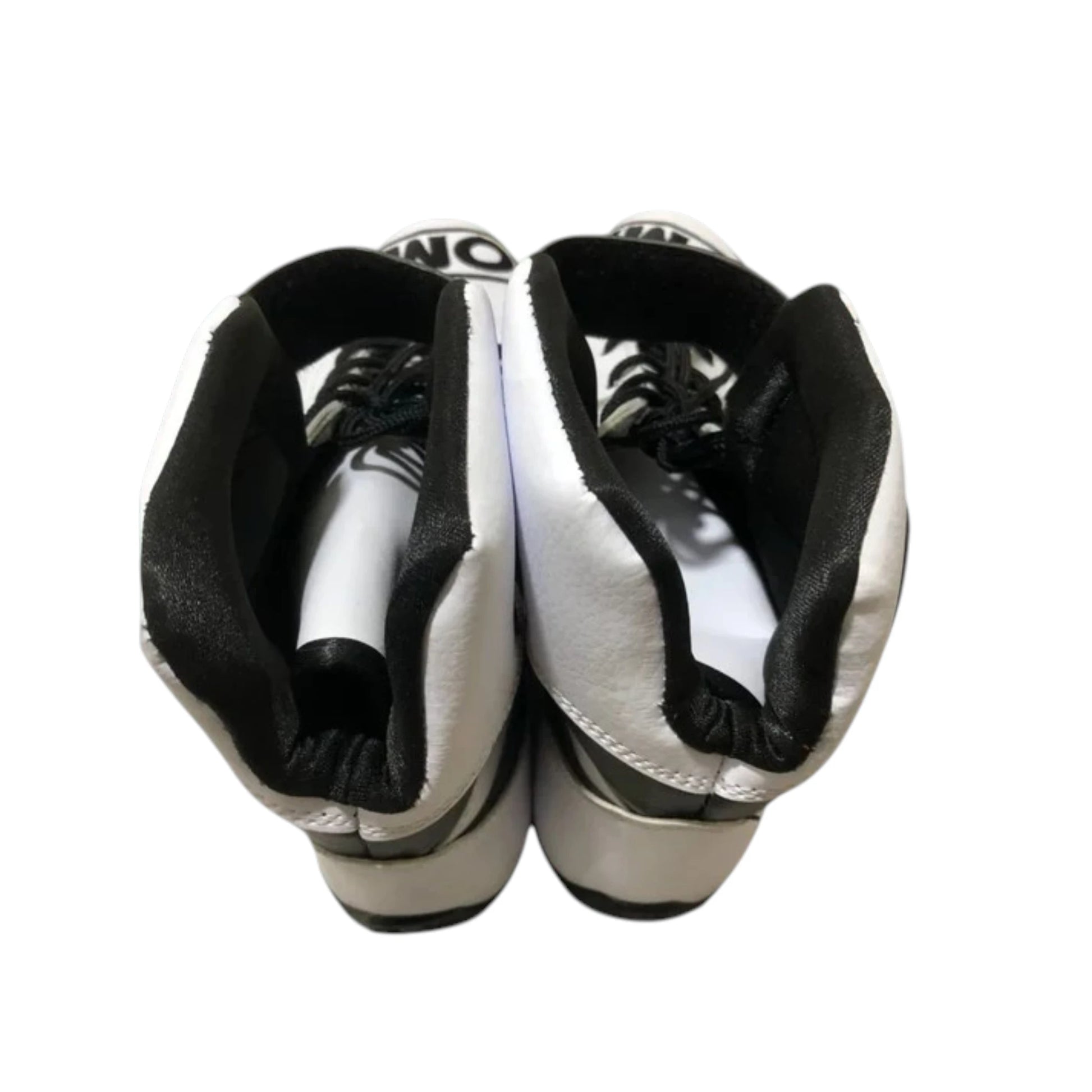 Sonny Hayes APXGP OMP F1 racing shoes featuring white and black APXGP OMP styling with motorsport detailing